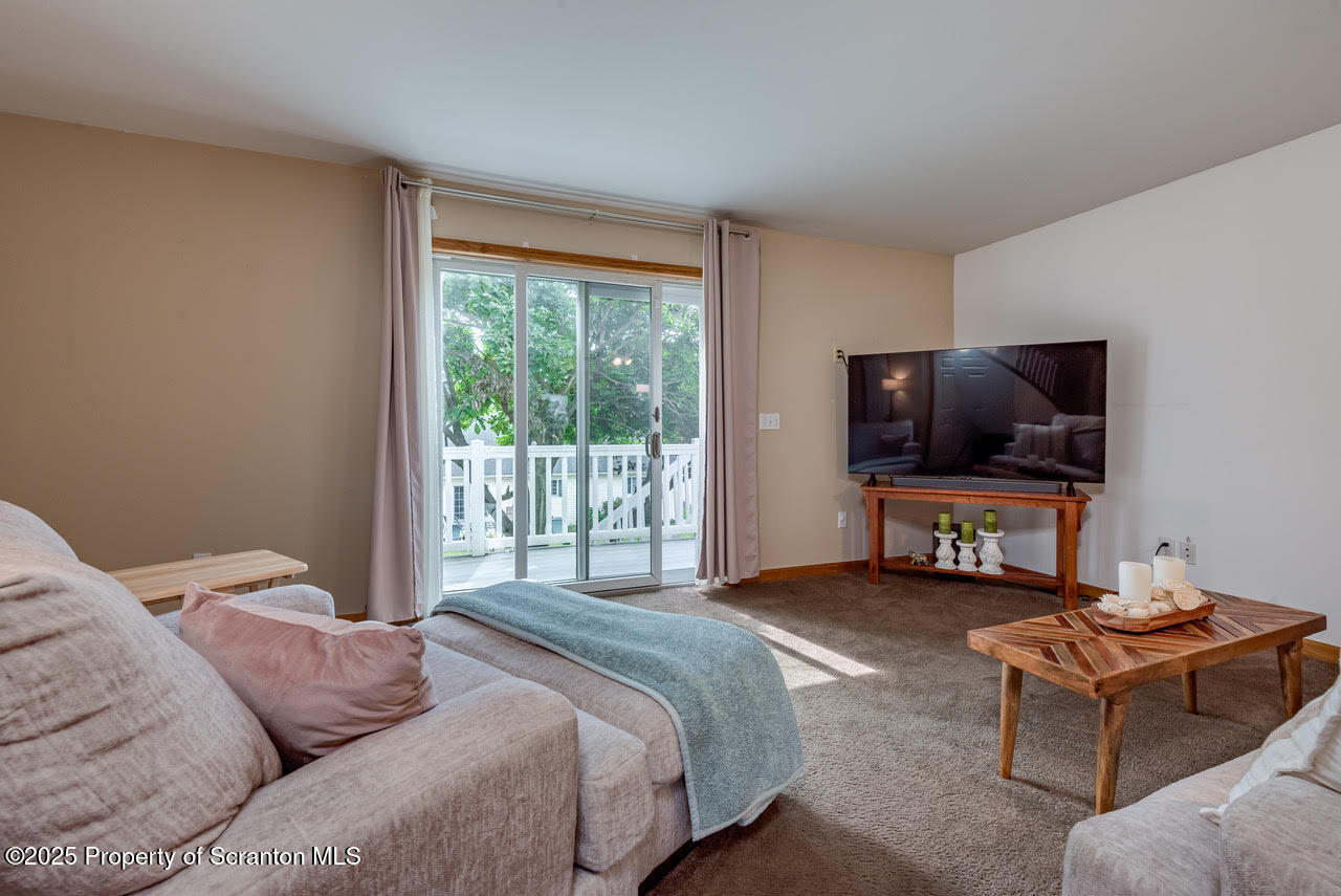 4 Scott Street Moosic, PA 18507 - Photo 11 of 23 a bedroom with a bed and a flat screen tv