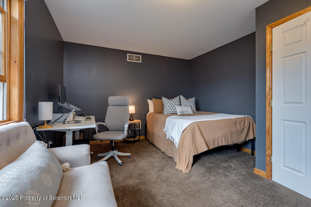 4 Scott Street Moosic, PA 18507 - Photo 17 of 23 a bedroom with a bed and window