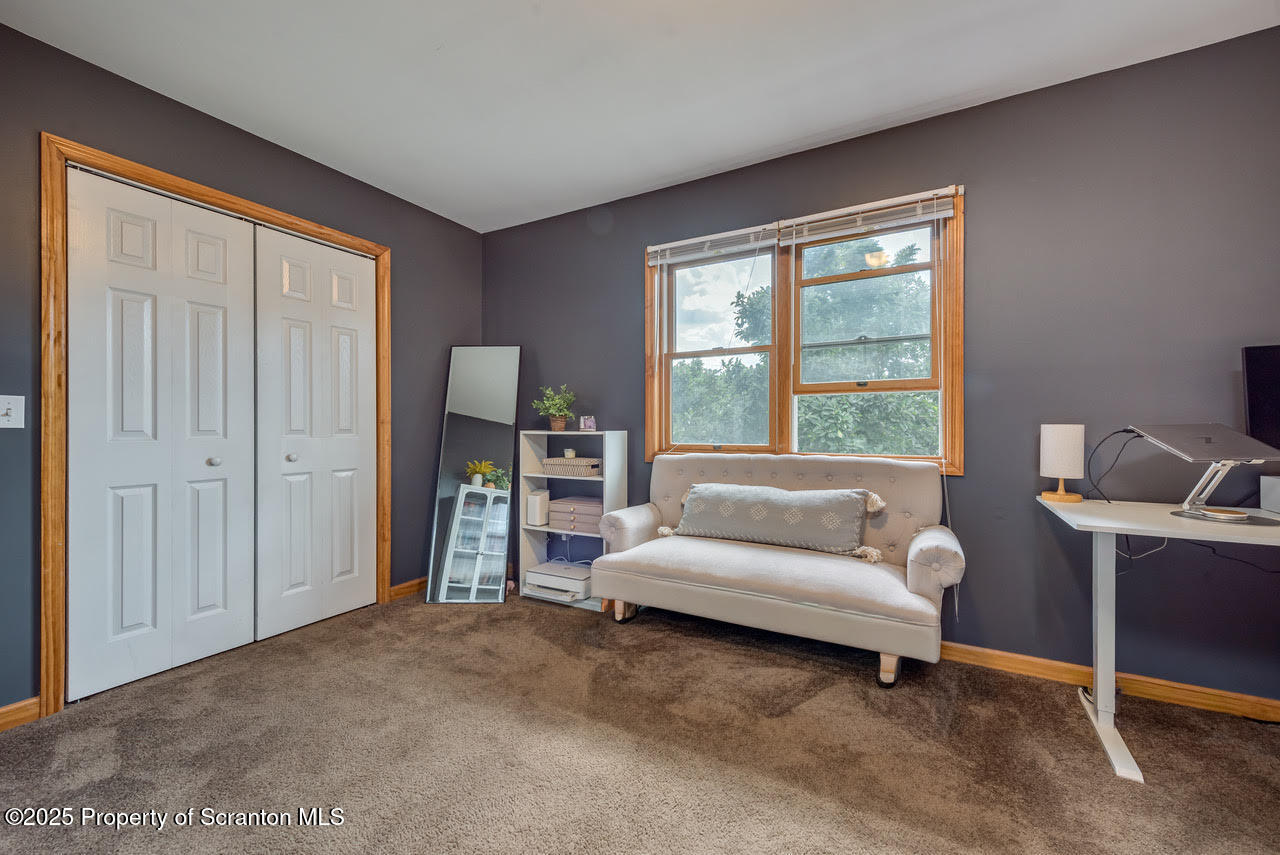 4 Scott Street Moosic, PA 18507 - Photo 18 of 23 a living room with furniture and a window