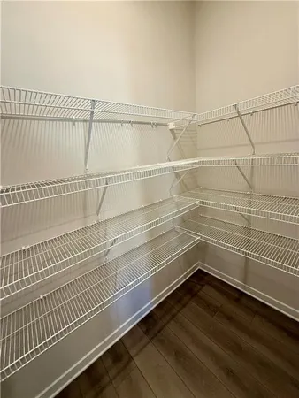 a view of a room with racks on the wall