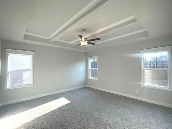a bathroom with a shower and a sink