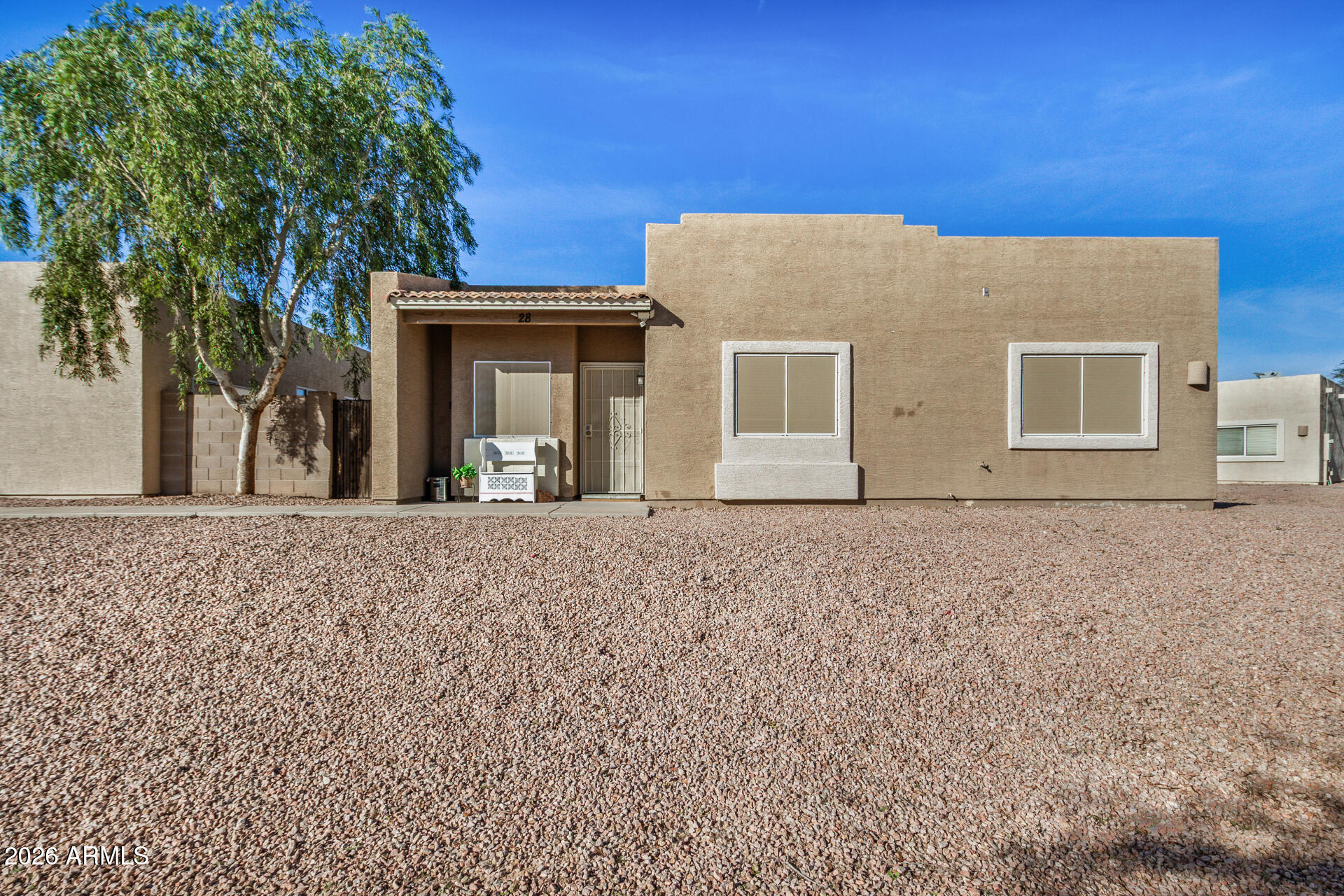 2300 East Magma Road, Unit 28 San Tan Valley, AZ 85143 - Photo 1 of 23 a view of a house with a yard