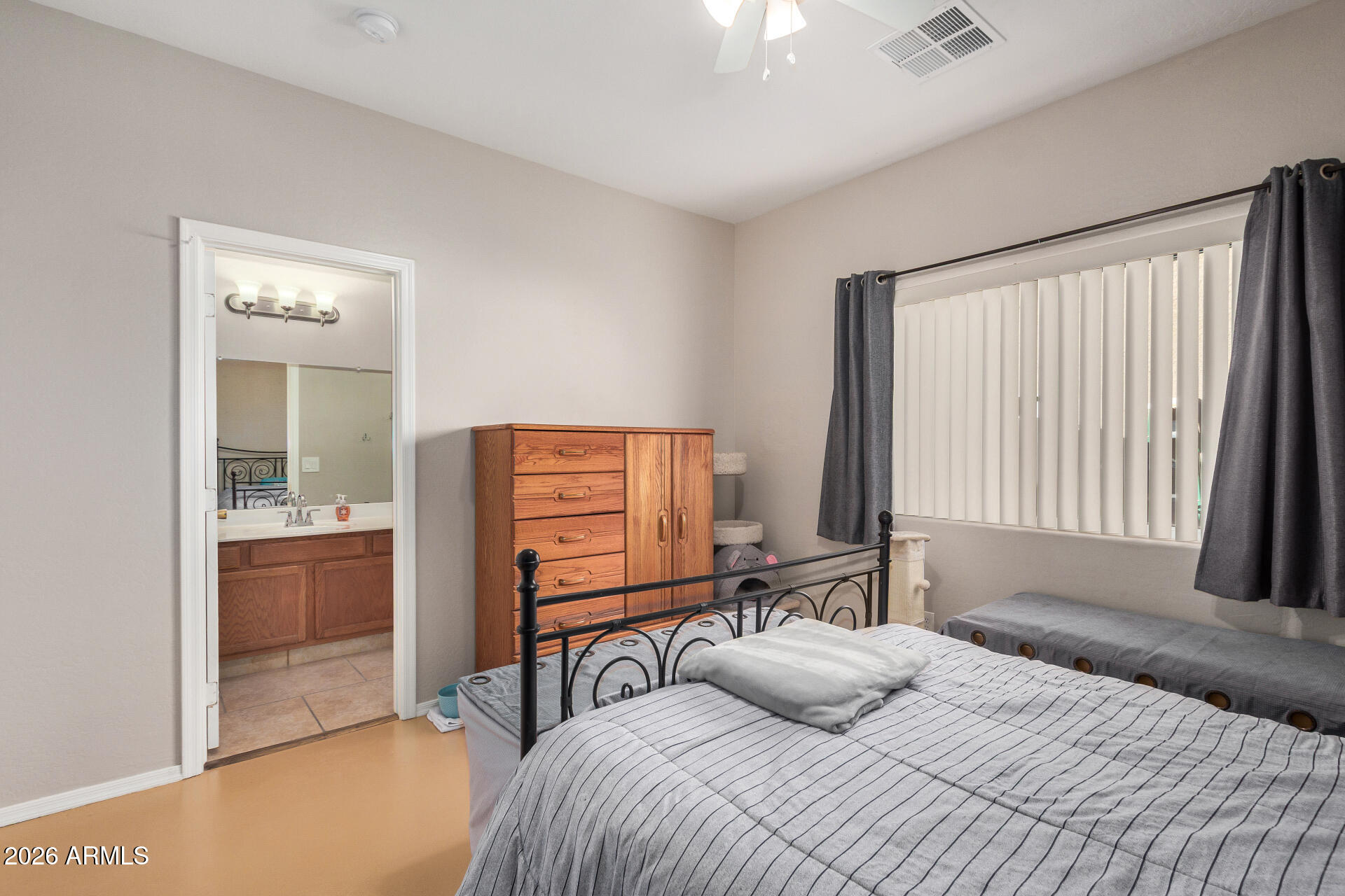 2300 East Magma Road, Unit 28 San Tan Valley, AZ 85143 - Photo 11 of 23 a bedroom with a bed and dresser
