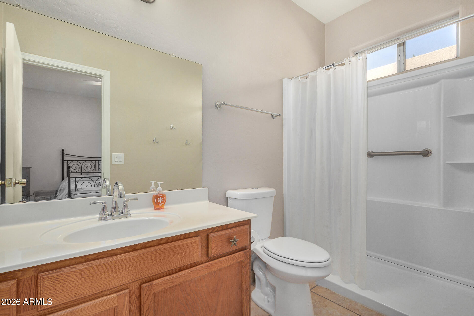 2300 East Magma Road, Unit 28 San Tan Valley, AZ 85143 - Photo 12 of 23 a bathroom with a sink toilet and shower