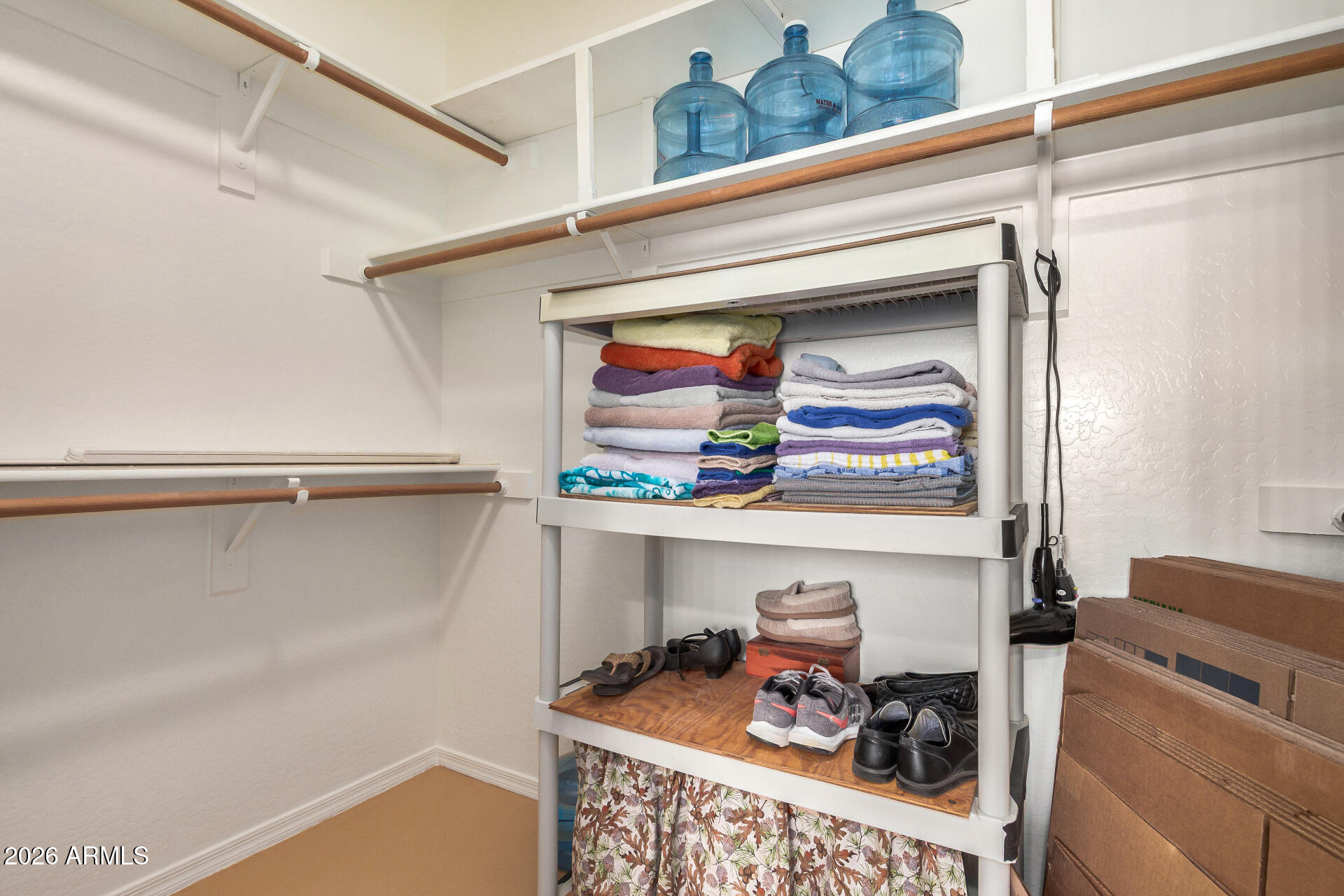 2300 East Magma Road, Unit 28 San Tan Valley, AZ 85143 - Photo 13 of 23 a view of storage and utility room with two washing machine