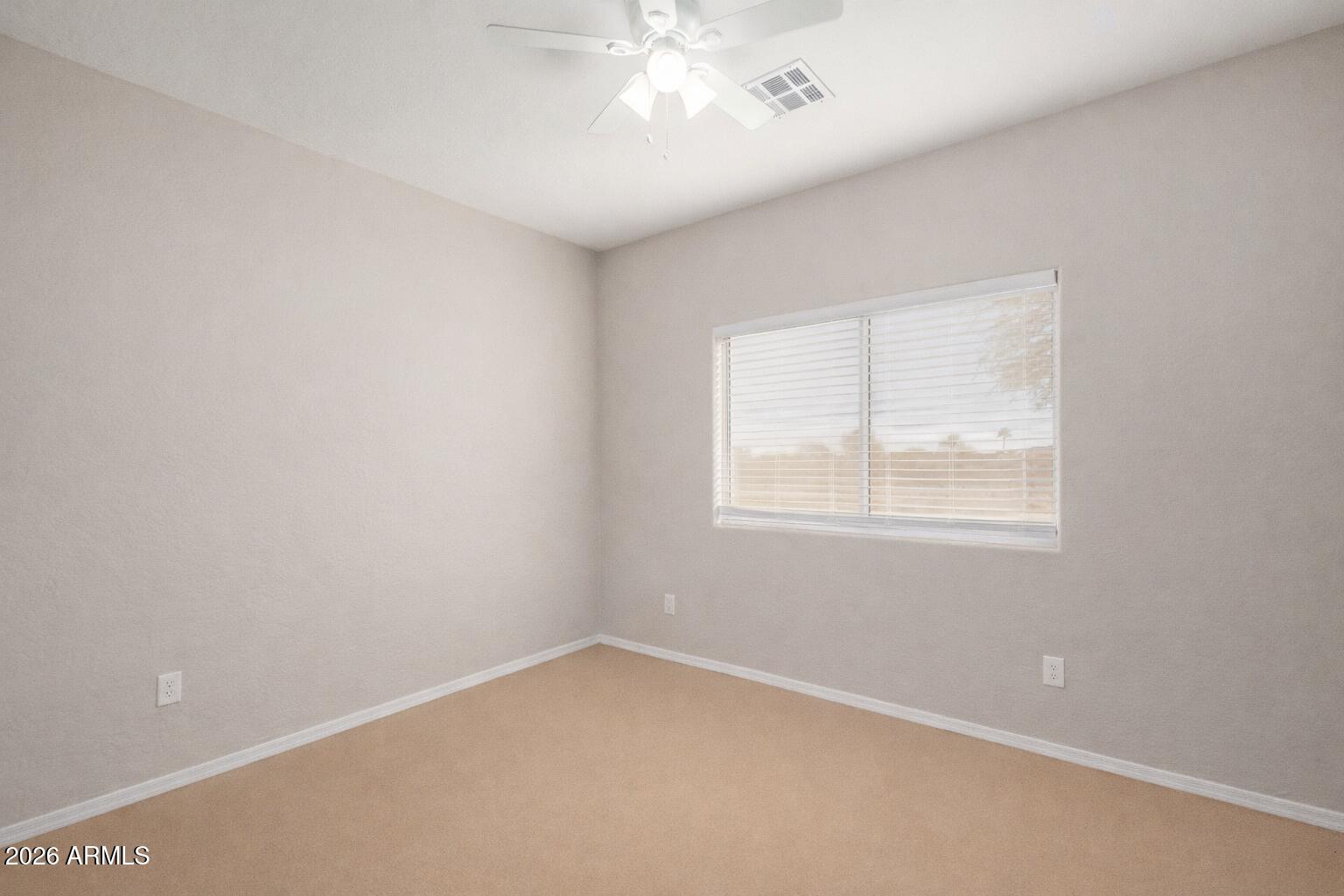 2300 East Magma Road, Unit 28 San Tan Valley, AZ 85143 - Photo 15 of 23 an empty room with a window