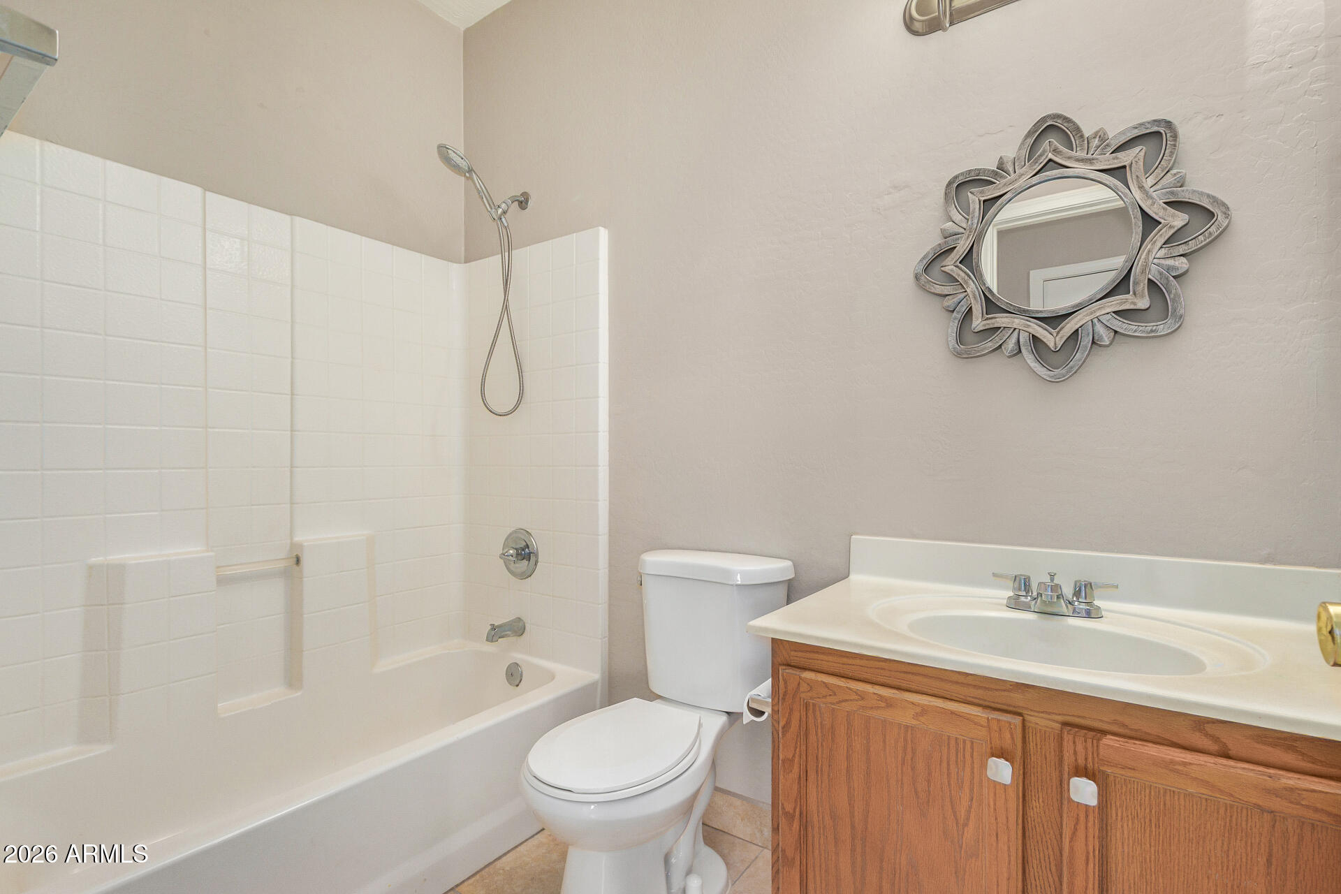 2300 East Magma Road, Unit 28 San Tan Valley, AZ 85143 - Photo 17 of 23 a bathroom with a sink a toilet and shower