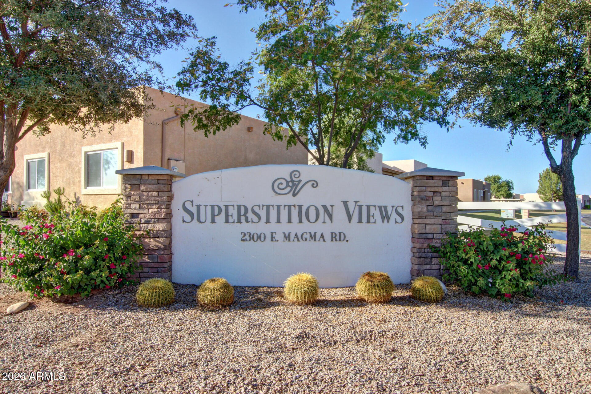 2300 East Magma Road, Unit 28 San Tan Valley, AZ 85143 - Photo 23 of 23 a sign on the side of a building