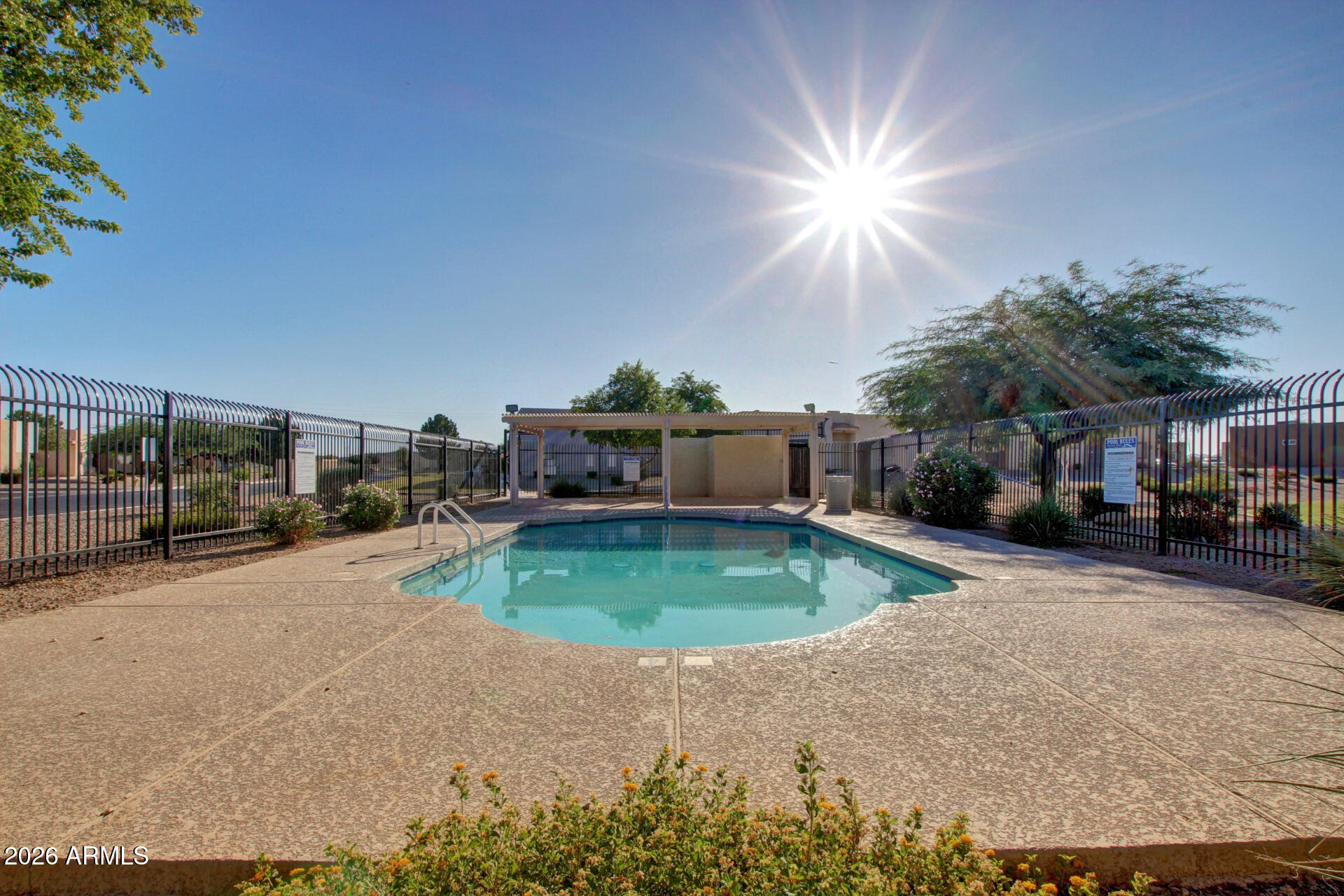 2300 East Magma Road, Unit 28 San Tan Valley, AZ 85143 - Photo 4 of 23 a view of a street with a building in the background