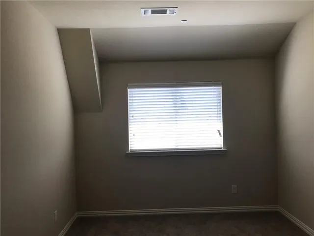 a view of a small space with a window