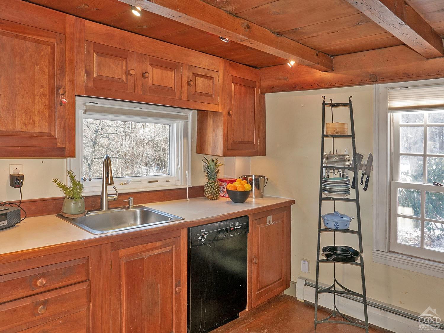 2216 County Rte 5 Canaan, NY 12029 - Photo 5 of 28 a kitchen with granite countertop a sink stove and cabinets