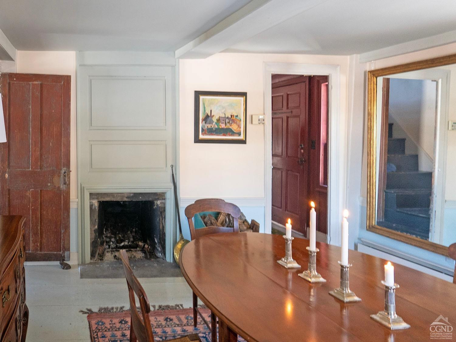 2216 County Rte 5 Canaan, NY 12029 - Photo 8 of 28 a living room with furniture and a fireplace