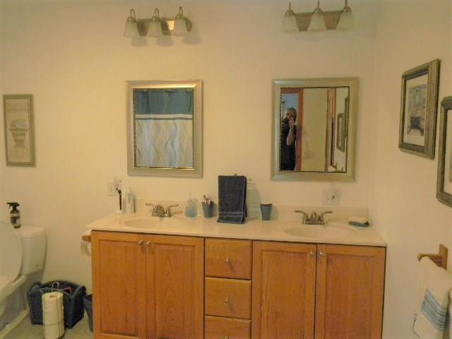 70 Colonial Road Westbrook, ME 04092 - Photo 20 of 35 Dual sink vanity in master en suite bath