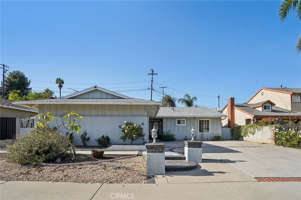 215 South Rock River Road Diamond Bar, CA 91765 - Photo 2 of 32 a front view of a house with garden
