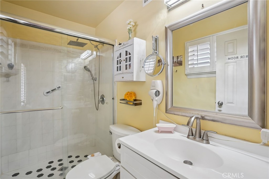 215 South Rock River Road Diamond Bar, CA 91765 - Photo 25 of 32 a bathroom with a sink toilet and shower