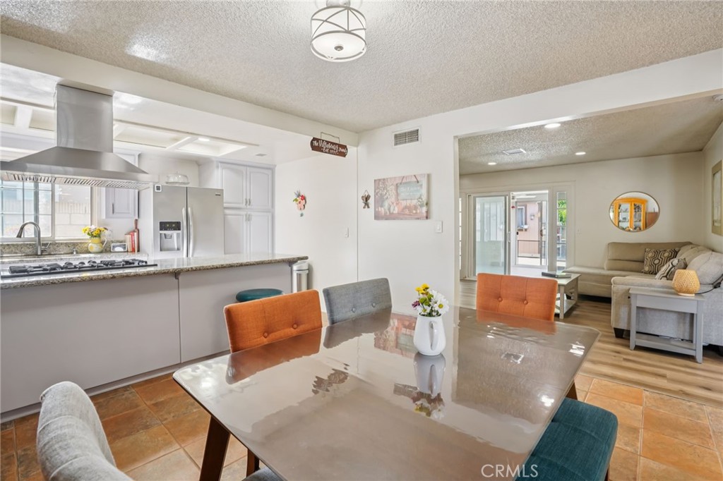 215 South Rock River Road Diamond Bar, CA 91765 - Photo 7 of 32 a living room with furniture and wooden floor
