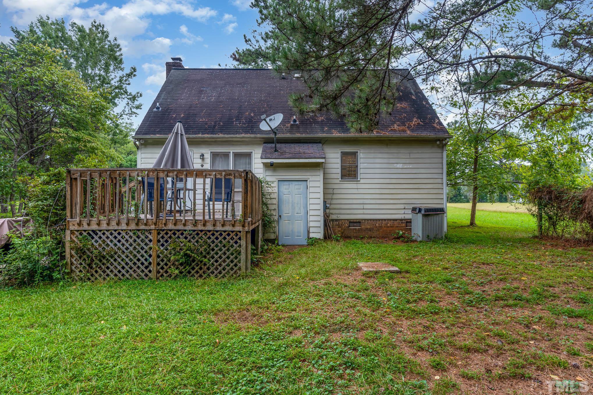 3233 Banks Road Raleigh, NC 27603 - Photo 23 of 27 a view of backyard of house with green space