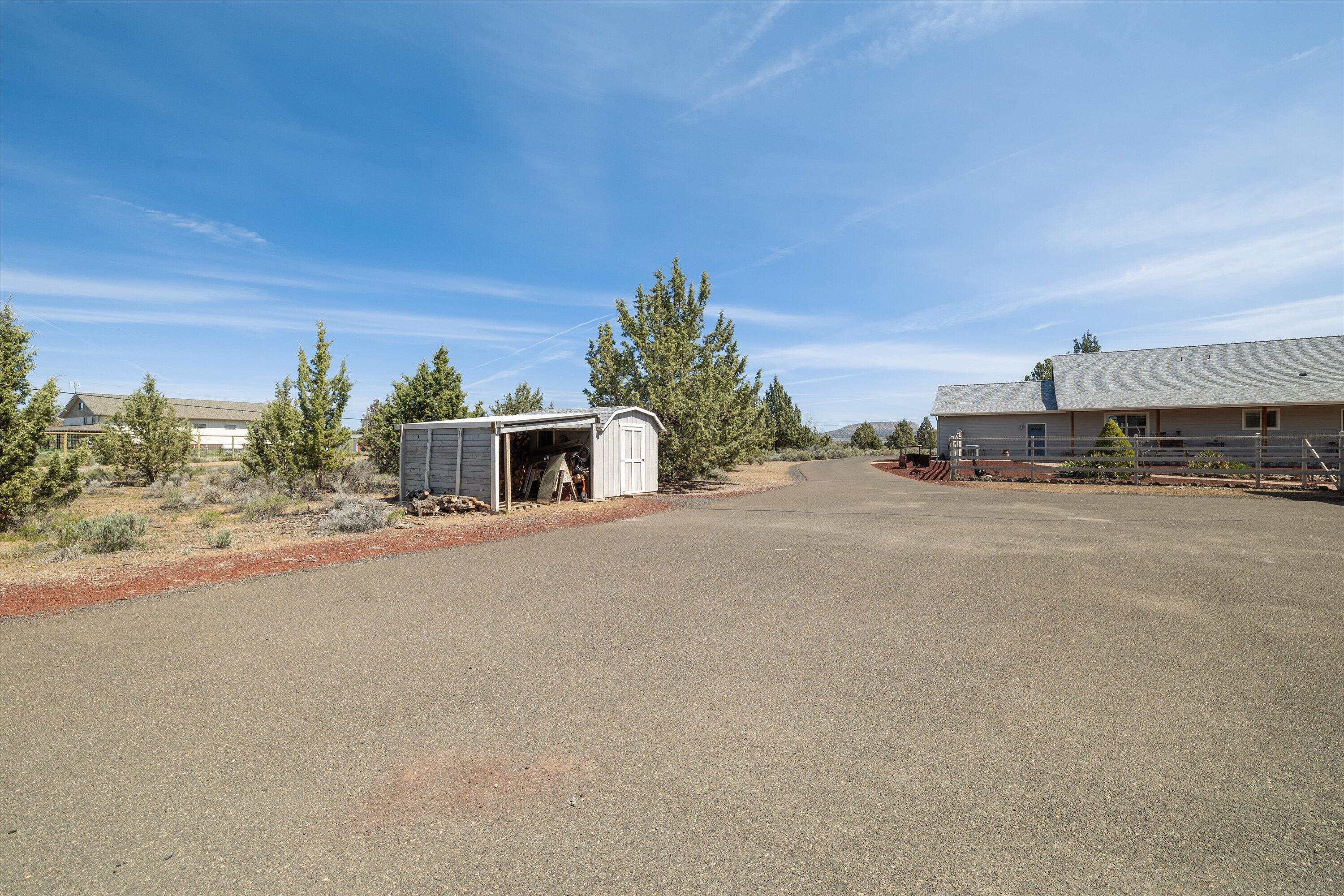 5585 Southwest Rim Road Terrebonne, OR 97760 - Photo 37 of 48 Woodshed/Storage