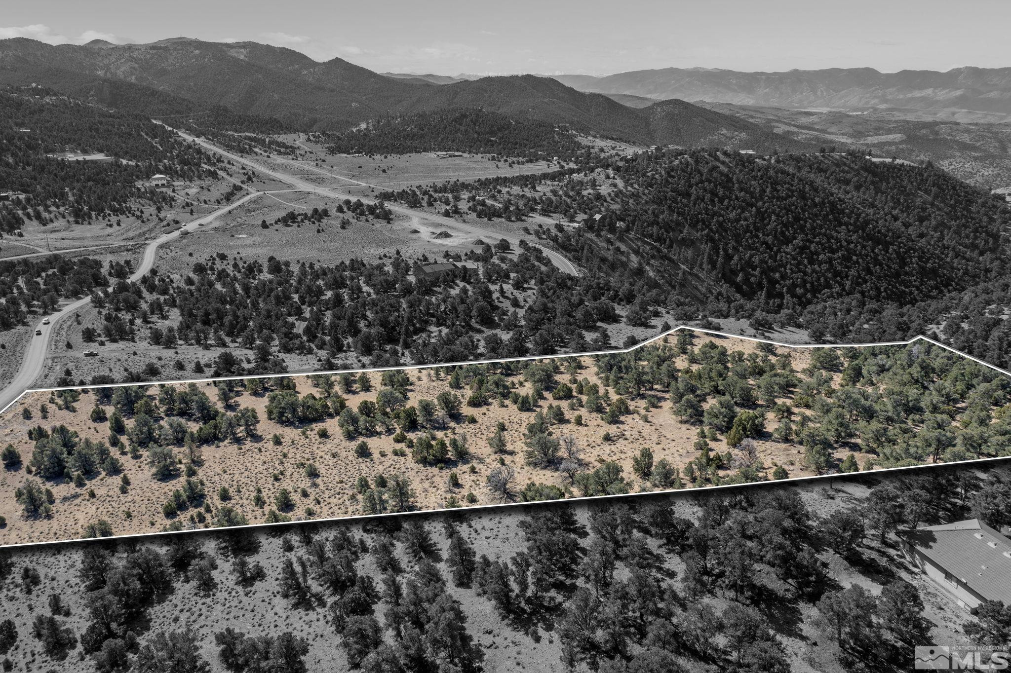 740 Cartwright Road Reno, NV 89521 - Photo 3 of 12 a view of a balcony with a forest