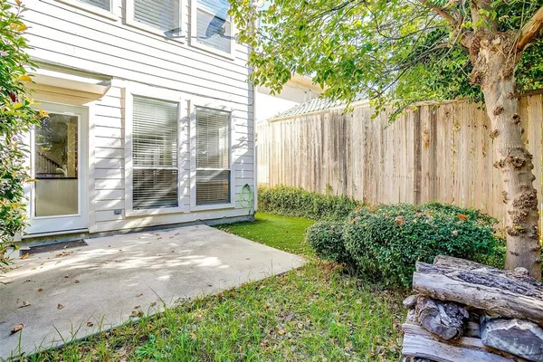 a view of a backyard with plants