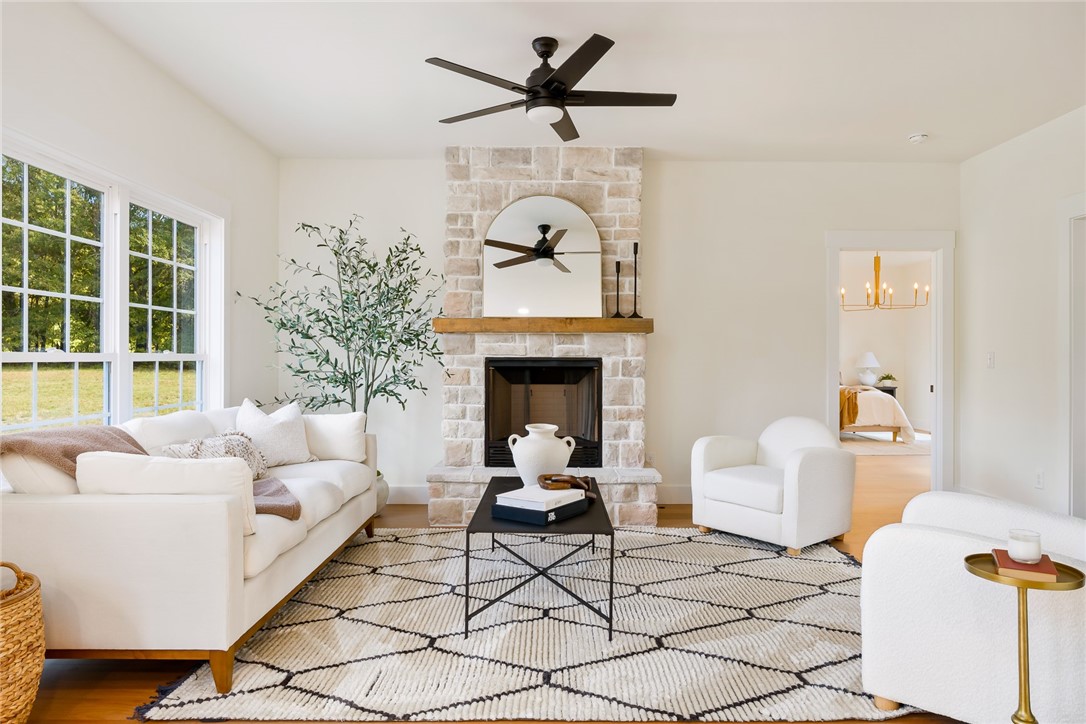5016 Copeland Road Belton, SC 29627 - Photo 18 of 50 Stone fireplace with gas insert & cedar mantle