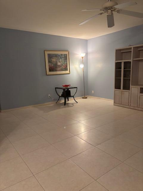 669 Saxony Place Delray Beach, FL 33446 - Photo 7 of 20 a view of an empty room with a window