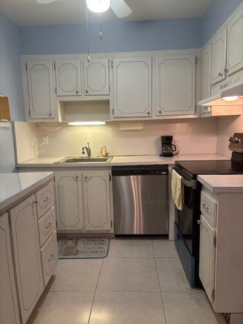 669 Saxony Place Delray Beach, FL 33446 - Photo 8 of 20 a kitchen with white cabinets