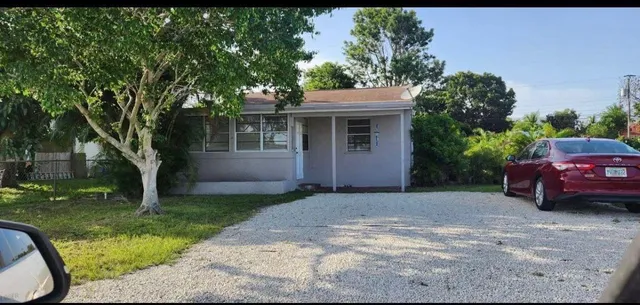 a view of a house with a garden