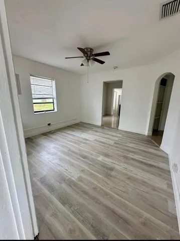 an empty room with windows