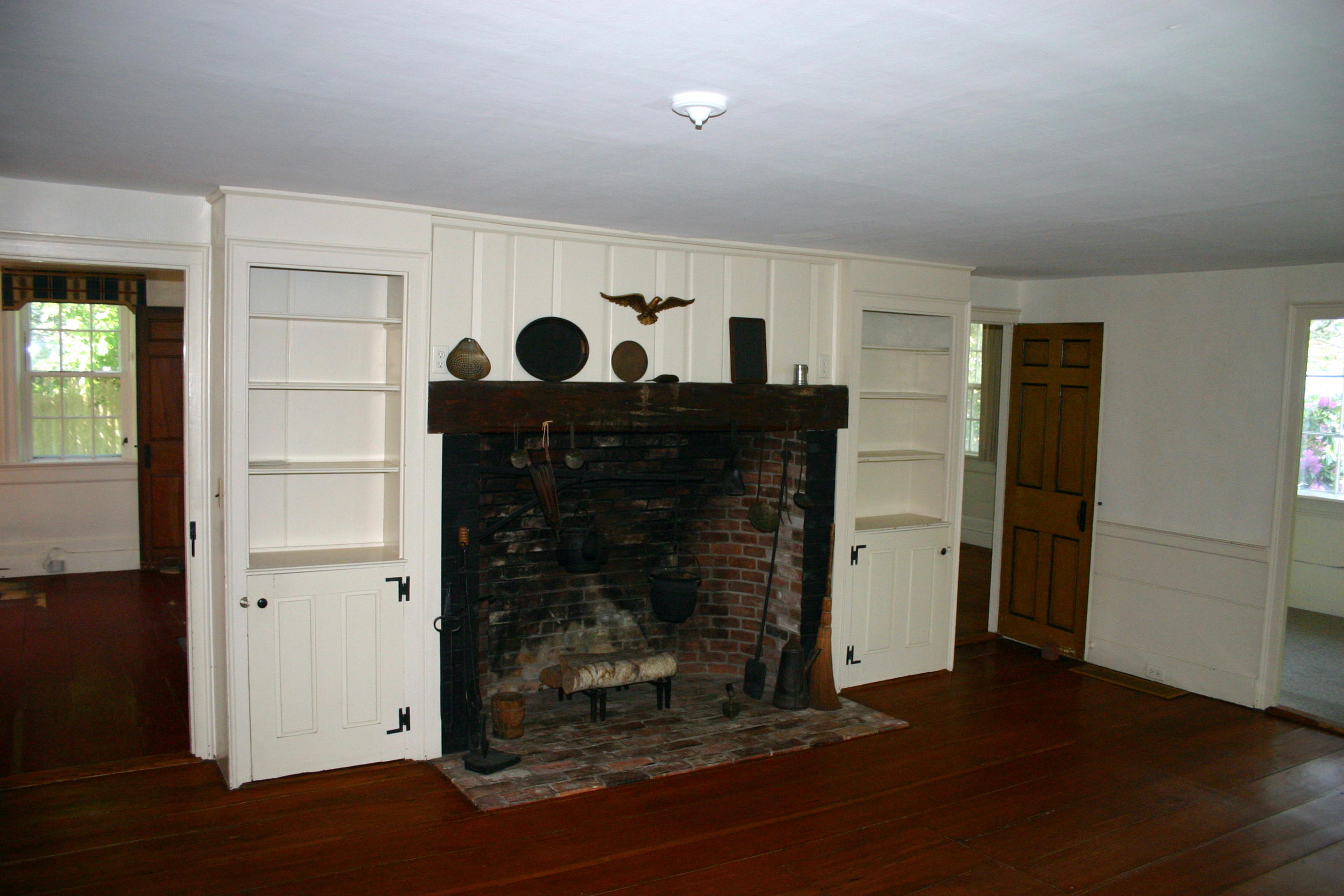 90 Old Harbor Road Chatham, MA 02633 - Photo 5 of 9 a view of an empty room with wooden floor and closet