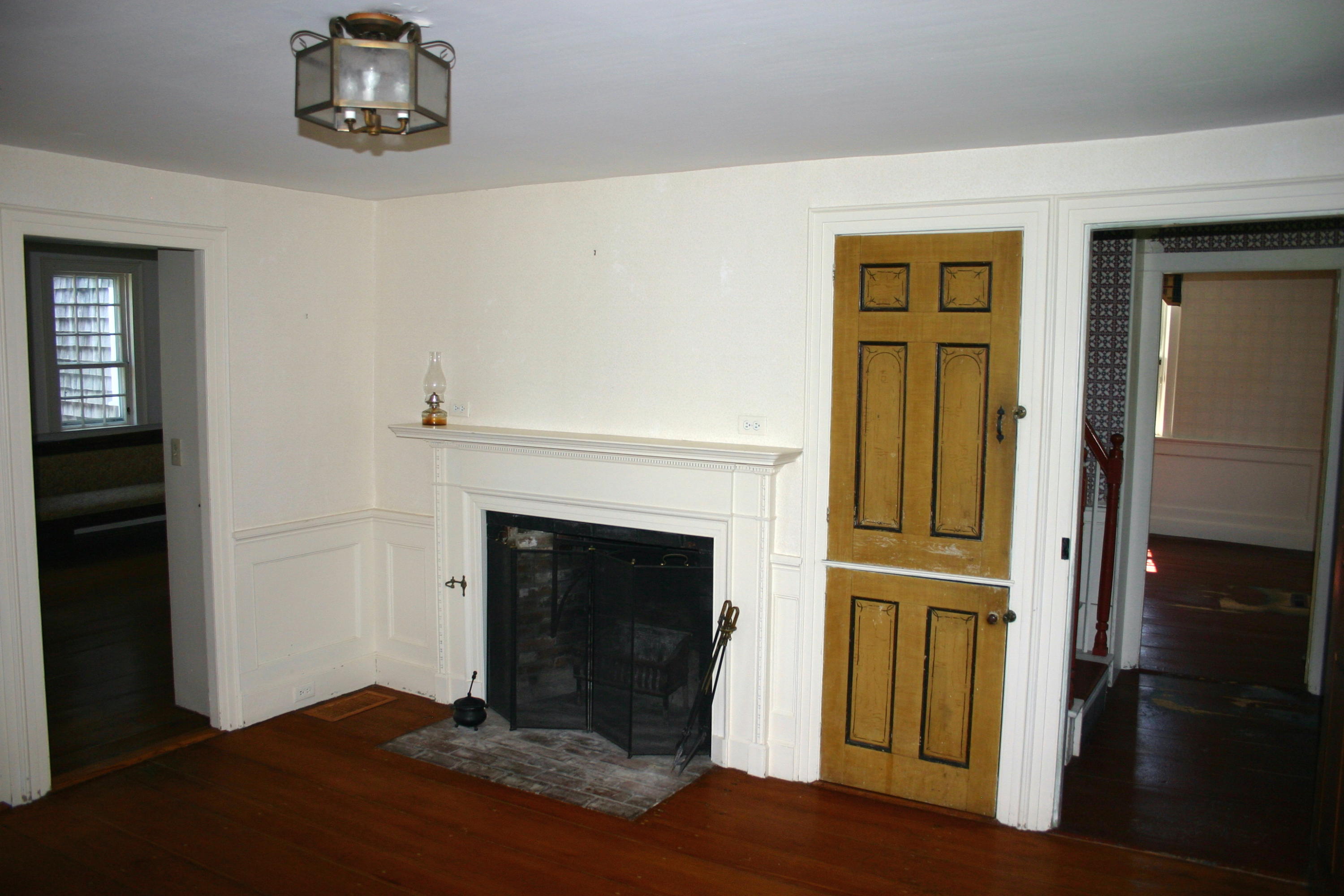 90 Old Harbor Road Chatham, MA 02633 - Photo 6 of 9 a living room with a fireplace