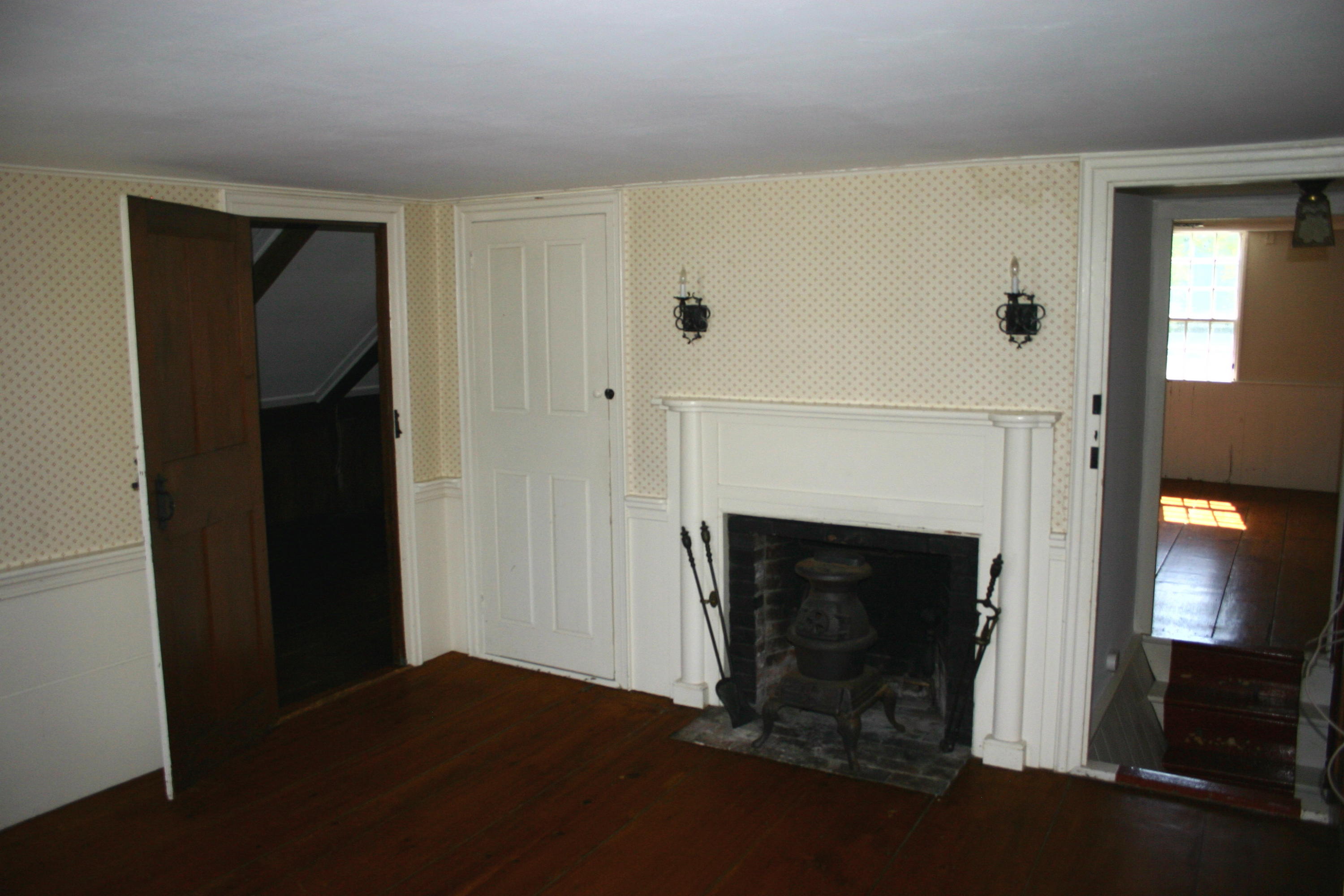 90 Old Harbor Road Chatham, MA 02633 - Photo 8 of 9 a living room with a fireplace