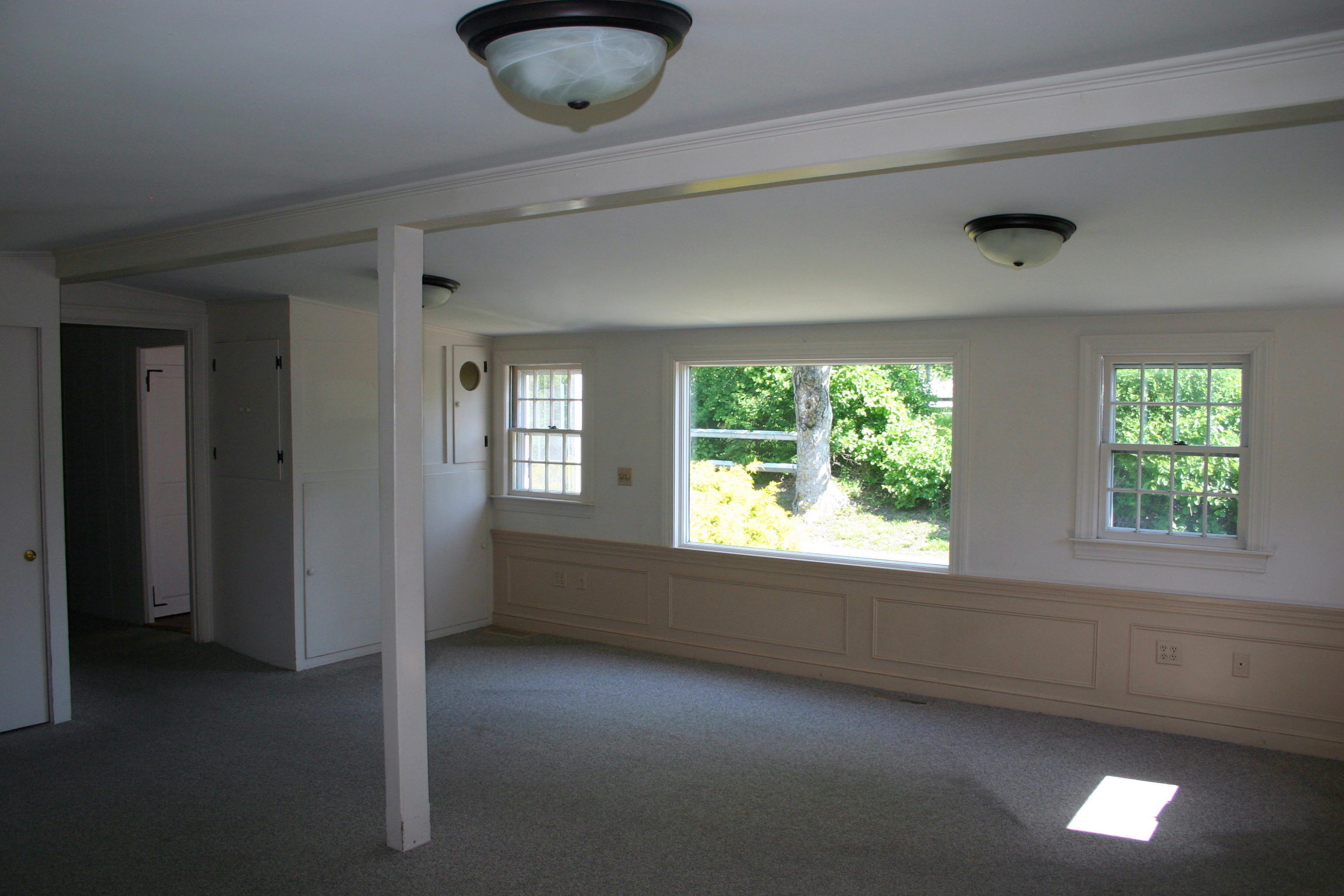 90 Old Harbor Road Chatham, MA 02633 - Photo 9 of 9 a view of an empty room and window