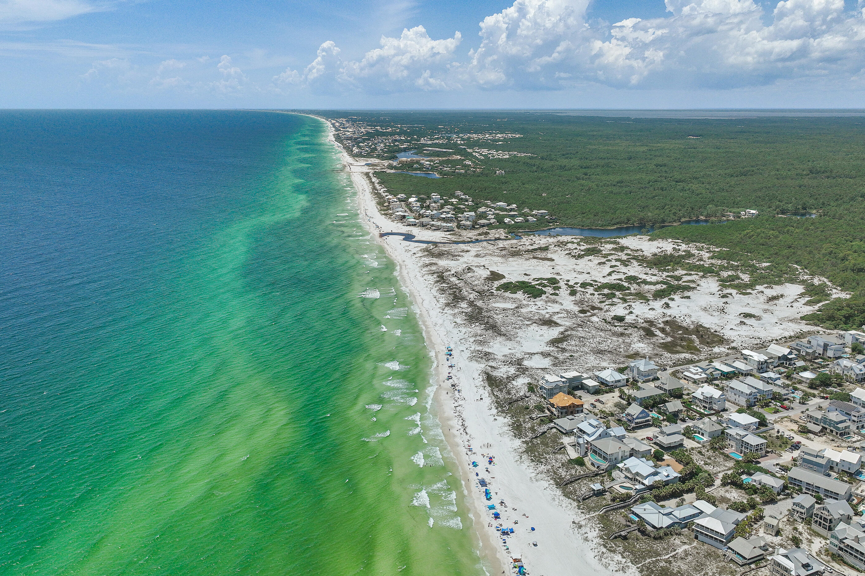 115 Sandy Lane Santa Rosa Beach, FL 32459 - Photo 17 of 18 a view of a lake from a yard