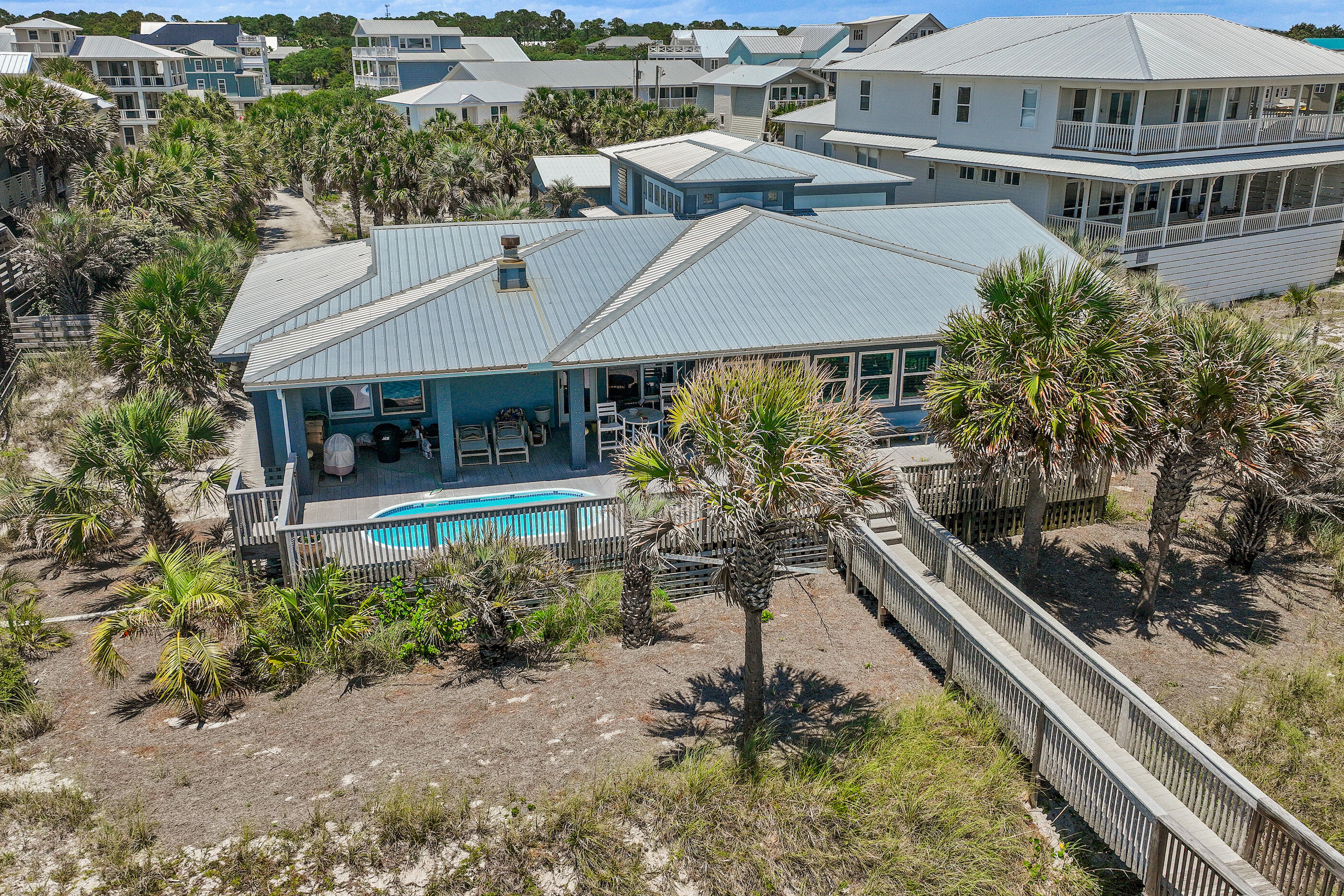 115 Sandy Lane Santa Rosa Beach, FL 32459 - Photo 18 of 18 an aerial view of a house with swimming pool garden and lake view