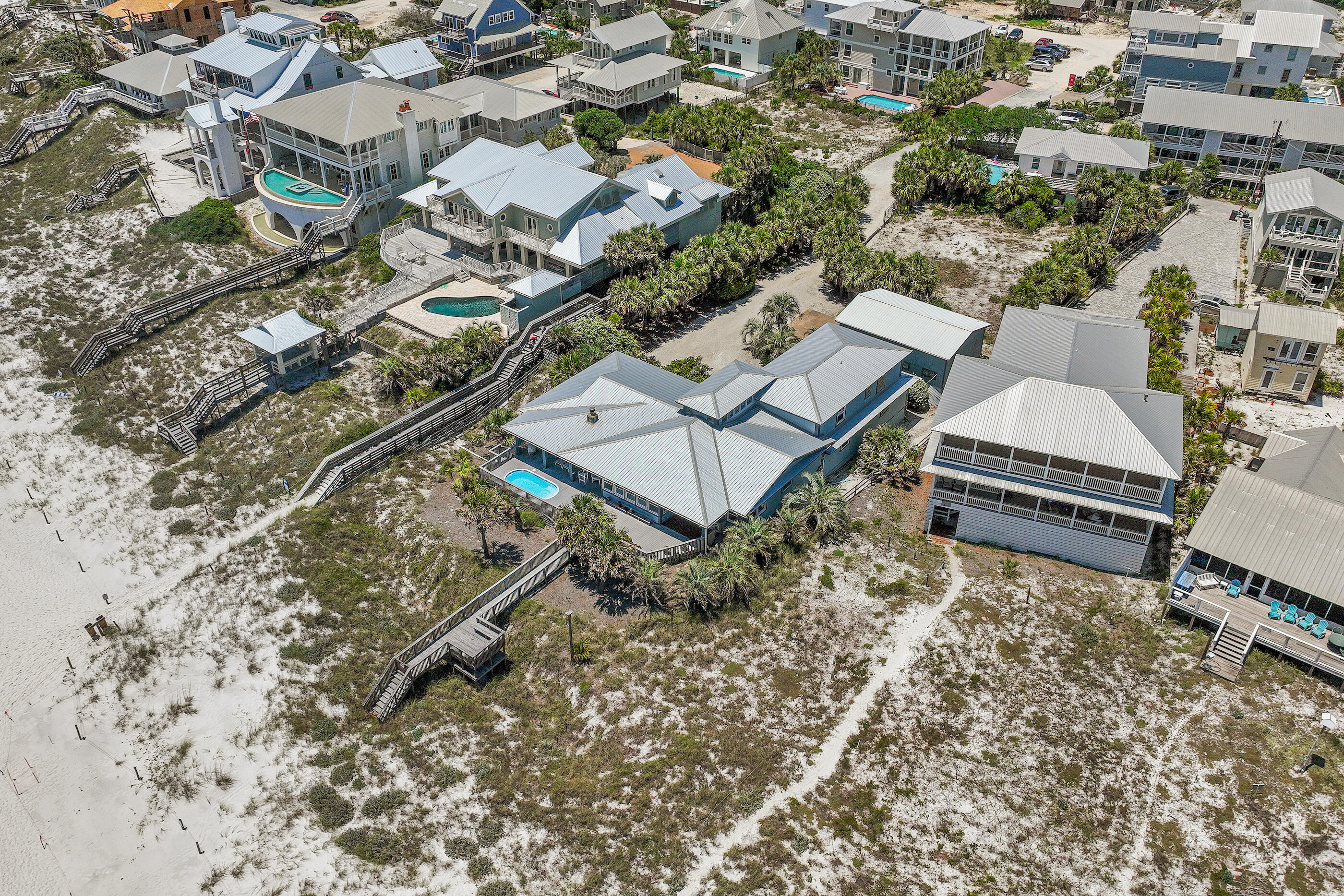 115 Sandy Lane Santa Rosa Beach, FL 32459 - Photo 5 of 18 an aerial view of a house with a yard and lake view