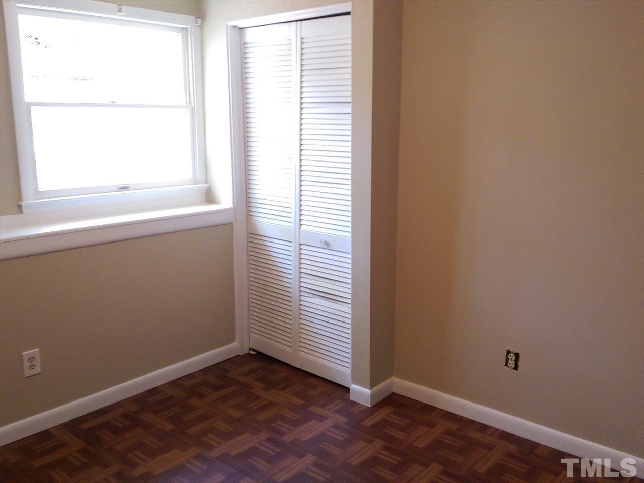 7909 Janet Court Raleigh, NC 27615 - Photo 14 of 25 an empty room with a window