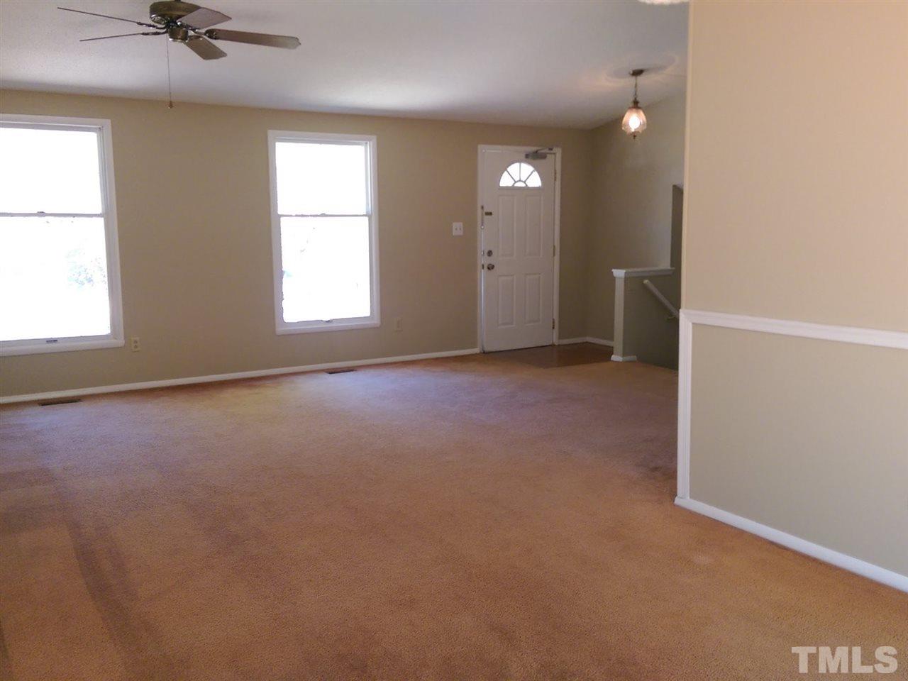 7909 Janet Court Raleigh, NC 27615 - Photo 3 of 25 an empty room with a window