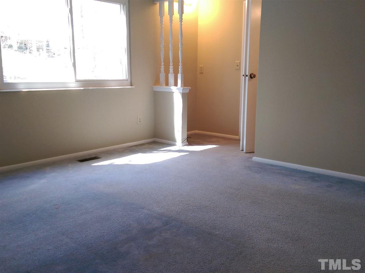 7909 Janet Court Raleigh, NC 27615 - Photo 8 of 25 an empty room with windows