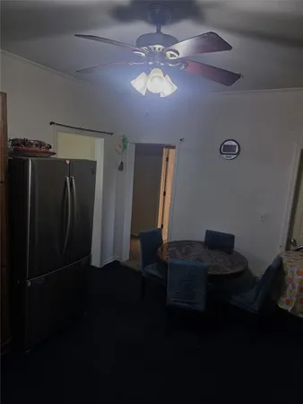 a view of a workspace with furniture