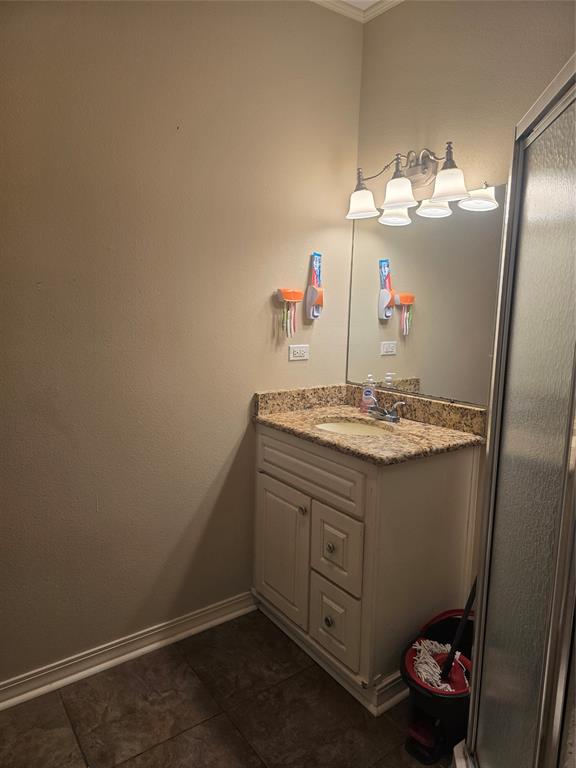206 Summit Street Minden, LA 71055 - Photo 20 of 23 a bathroom with a sink and a mirror