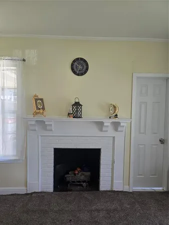 a living room with a fireplace