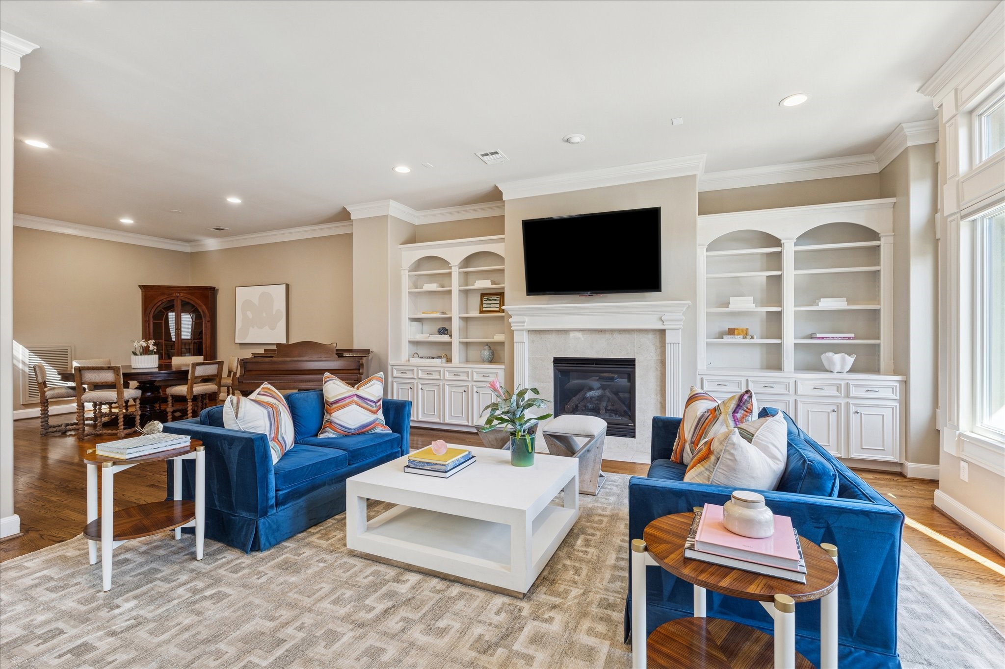 1712 McDuffie Street Houston, TX 77019 - Photo 6 of 27 a living room with furniture fireplace and a flat screen tv