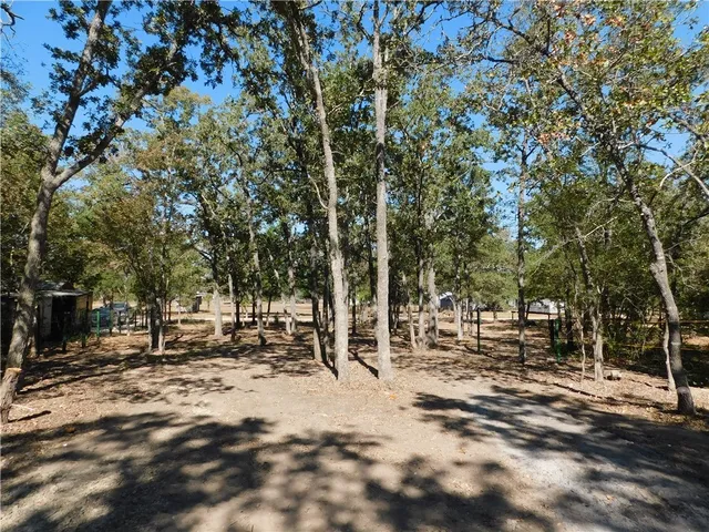 a view of road with trees