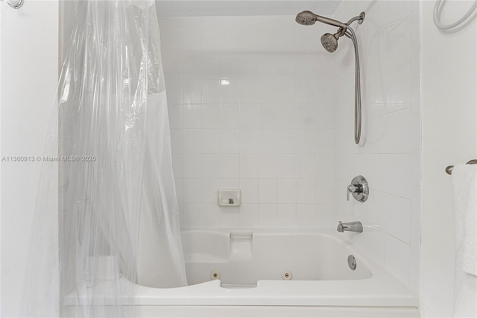 17050 North Bay Road, Unit 807 Sunny Isles Beach, FL 33160 - Photo 18 of 50 a bathroom with a shower