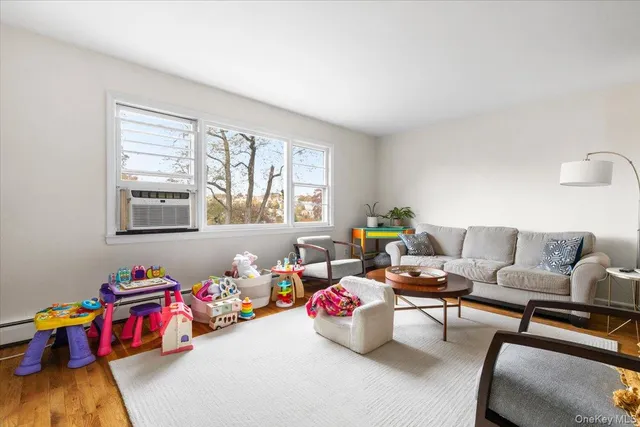 a living room with furniture and a table