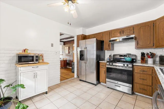 a view of a balcony with yard