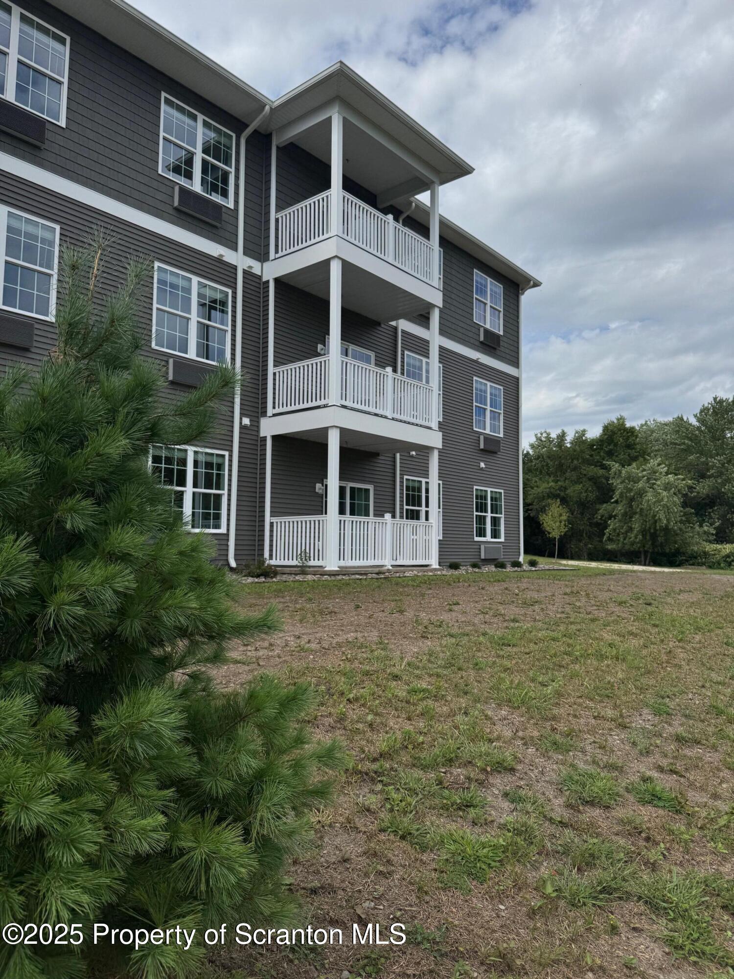 435 Circle Drive Taylor, PA 18517 - Photo 33 of 33 a large building with a large window