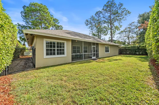 front view of a house with a garden