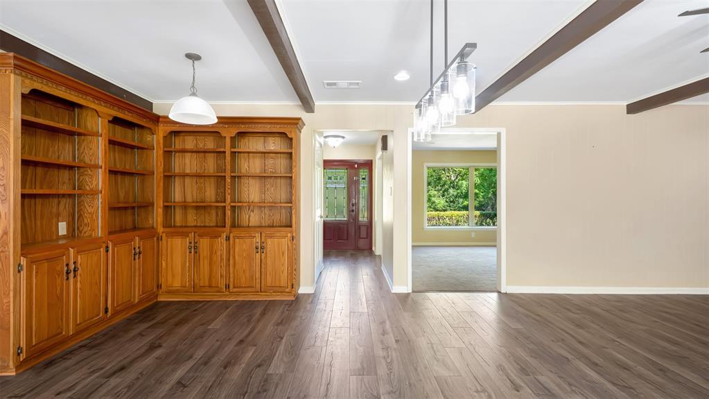 2801 Florence Street Kilgore, TX 75662 - Photo 15 of 39 a view of livingroom with hardwood floor and window